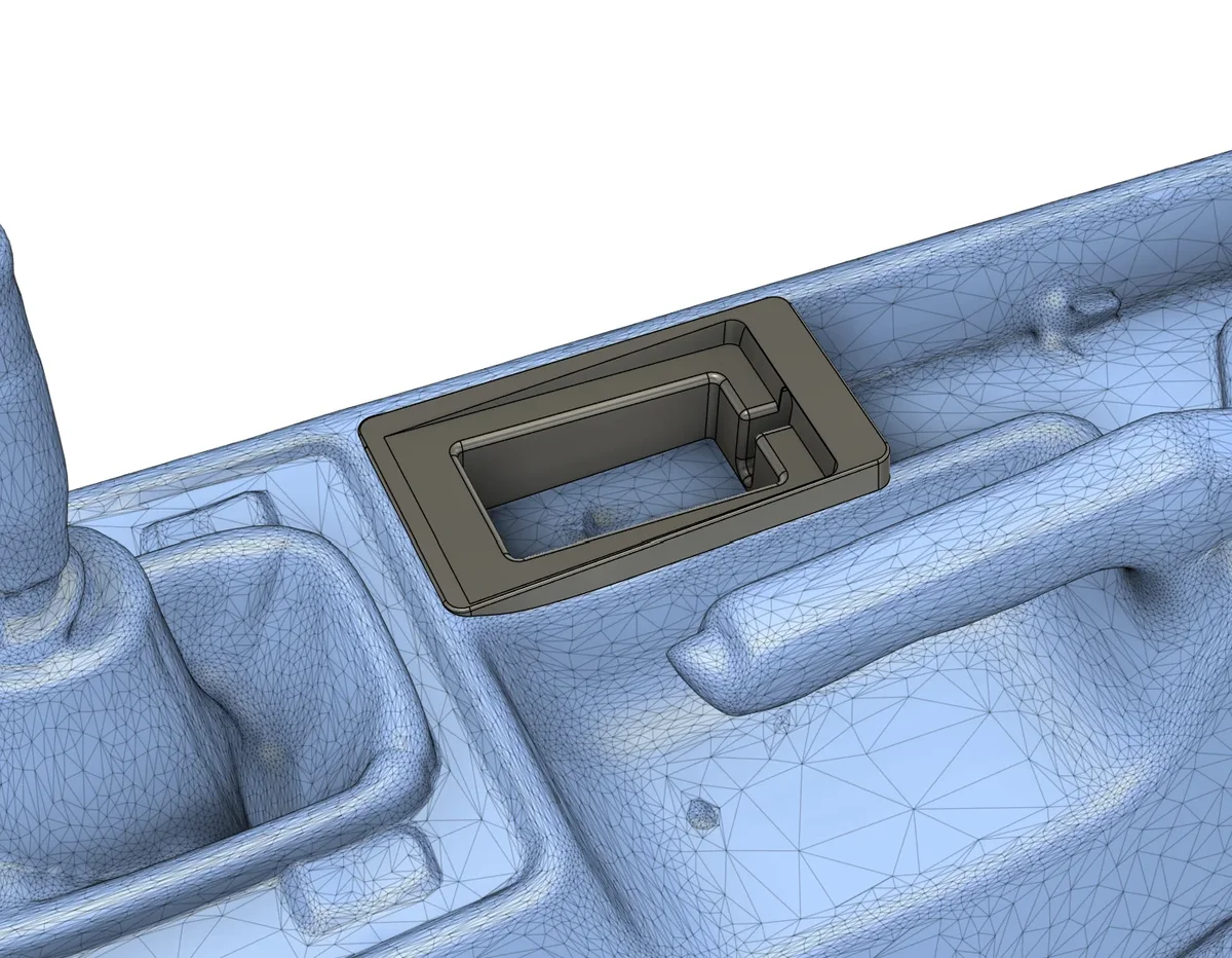 3D-mallinnus auton keskikonsoliin: skannattu malli ja suunniteltu osa